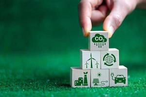 Net zero greenhouse gas emissions reduction with carbon credit concept. Reduce carbon dioxide e.g. renewable energy production improve the efficiency of transportation reduce environmental pollution. photo