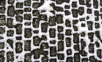 Snowy cobblestone floor photo