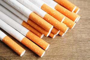 Cigarette, roll tobacco in paper with filter tube, No smoking concept. photo