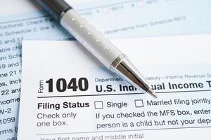 Tax form 1040 U.S. Individual Income Tax Return, business finance concept. photo