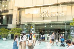 Bangkok Thailand Feb 23 2023 Siam Discovery Sign or logo of building. Siam Discovery is a famous shopping mall at Bangkok. near Siam square. many people walking and shopping. photo