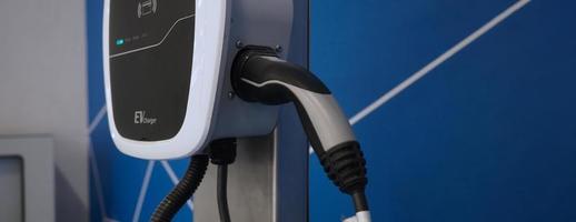 EV Charger car station charging use AC socket plug for electric engine vehicle. photo