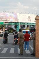 Kudus, December 2022. Photo portrait of the Kudus Expo Micro, Small and Medium Enterprises, with various kinds of clothing, food and drinks. located in the Kudus square crowded with sellers  visitors.