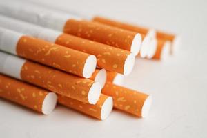 Cigarette, roll tobacco in paper with filter tube, No smoking concept. photo