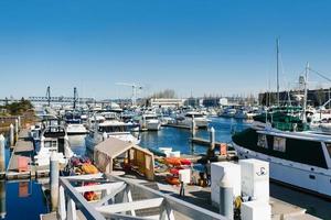 Tacoma, Washington, USA. March 2022. Boats on Puget Sound on a clear sunny day photo