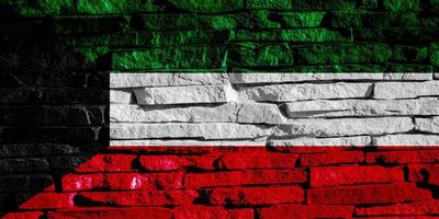Flag of Kuwait on a textured background. Concept collage. photo