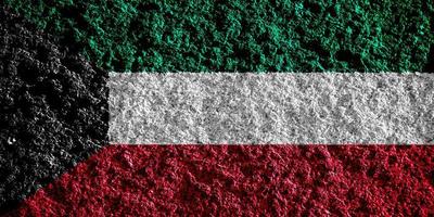 Flag of Kuwait on a textured background. Concept collage. photo