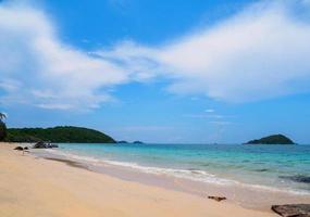 Beautiful Landscape viewpoint for design postcard and calendar  tropical rock beach front view sea blue sky overlooking Nang Ram Beach Sattahip Bay Chonburi Thailand On clear day white cloud holiday photo