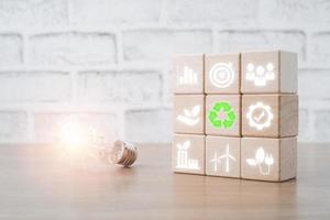 ESG concept of environmental, Wooden cube block with ESG icon with copy space, social and corporate governance concept photo