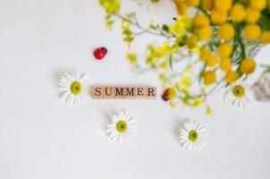 bright floral layout with the word summer photo