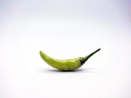 Light green chili pepper isolated on white background photo