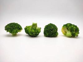 Broccoli collection. Different sides of green fresh broccoli.  Isolated on white background. photo