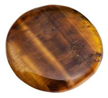 cabochon from tigers eye gemstone isolated photo
