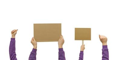 Woman's hand holding blank banner mock up on wood stick isolated. Empty board plank with space for shouting text rule or protest word. photo