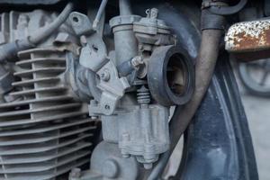 selective focus to old carburetor motors without air filter, soft focus photo
