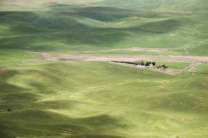 Rolling hills in East Washington with different shades of green photo