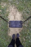 Swings in a playground photo