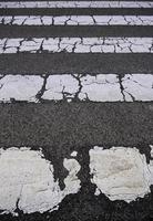 Old pedestrian crossing on the asphalt photo