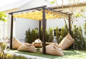 Outdoor living tent in backyard photo