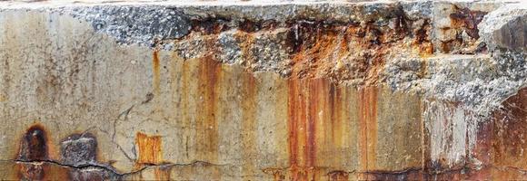 Texture crack concrete wall with rust stains photo