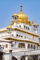 View of details of architecture inside Golden Temple Harmandir Sahib in Amritsar, Punjab, India, Famous indian sikh landmark, Golden Temple, the main sanctuary of Sikhs in Amritsar, India photo