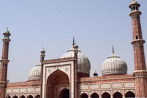 Delhi, India -April 15, 2022 - Unidentified Indian tourists visiting Jama Masjid during Ramzan season, in Delhi 6, India. Jama Masjid is the largest and perhaps the most magnificent mosque in India photo