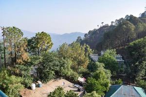 Early morning view of Modern rooftop restaurant at Kasauli, Himachal Pradesh in India, View of mountain hills from open air restaurant in Kasauli, Kasauli Rooftop restaurant photo