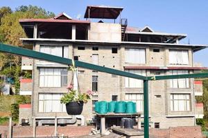 Early morning view of Modern rooftop restaurant at Kasauli, Himachal Pradesh in India, View of mountain hills from open air restaurant in Kasauli, Kasauli Rooftop restaurant photo