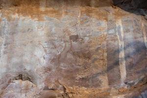 Prehistoric rock paintings in Badami in Karnataka, India photo