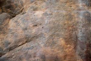 Prehistoric rock paintings in Badami in Karnataka, India photo