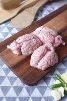 mutton brain on a chopping board photo