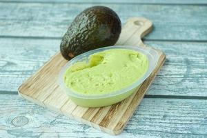 avocado spread on a chopping board photo