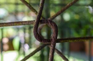 abstract rusty iron rebar forming a circle with lines photo