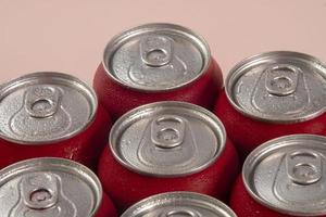 Cold red soda cans for conceptual use photo