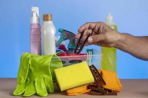 basket with cleaning products for home hygiene use photo