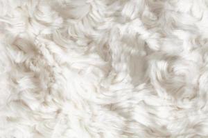 Background of white faux fur closeup. photo