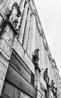 View of a Wall with Big Rock Sculptures. Black and White Photography. photo