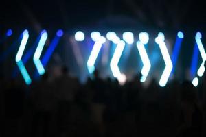 Blue stripes of optical bokeh on a black background. photo