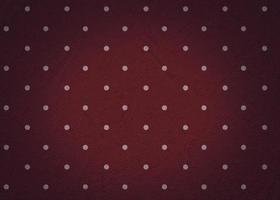 Red textural vintage background with white polka dots. photo