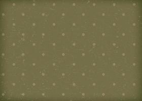 Vintage green paper with white polka dots. Old worn paper wallpaper in a grassy muted color. photo