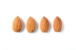 Almonds nut isolated on white background. They are highly nutritious and rich in healthy fats photo