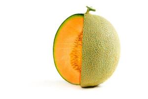 Half of japanese melons, orange melon or cantaloupe melon with seeds photo