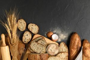 slide multi grain sourdough bread and sliced Baguette with Whole Wheat Flour photo