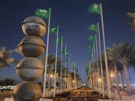 Jeddah, Saudi Arabia, Feb 2023 - A beautiful view of the flags of Saudi Arabia on the Jeddah Corniche on the occasion of the Foundation Day of Saudi Arabia. photo