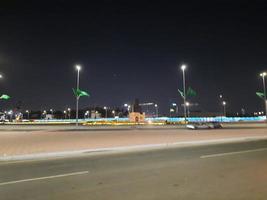 Jeddah, Saudi Arabia, Feb 2023 - Beautiful view of traffic on Jeddah Corniche at night. photo