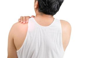 A middle aged man in white veat suffering from arm and shoulder pain isolated photo