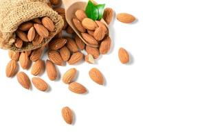 Top view of Almonds nut isolated on white background. They are highly nutritious and rich in healthy fats photo