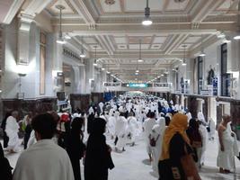 Mecca, Saudi Arabia, Feb 2023 - Pilgrims walk between the hills of Safa and Marwah during Umrah at the Masjid Al Haram in Mecca. photo