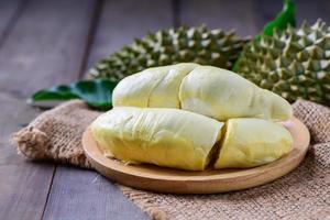 Long Laplae Durian on  wood plate,It is the most expensive and most delicious of all durians. photo