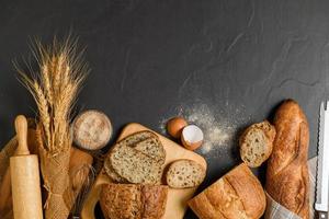 slide multi grain sourdough bread and sliced Baguette with Whole Wheat Flour photo